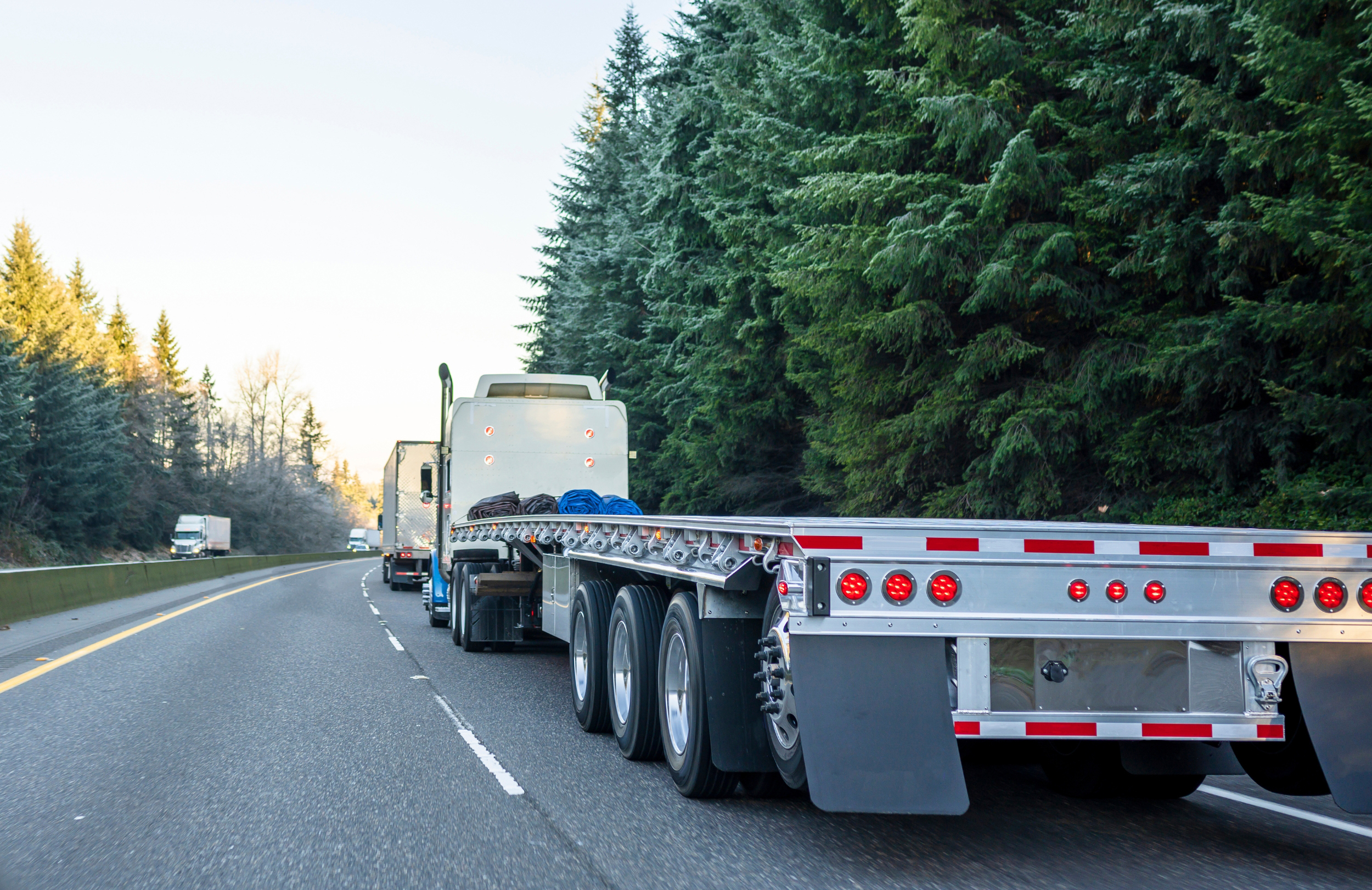 Buchanan Logistics flatbed picking up freight to transport nationwide.