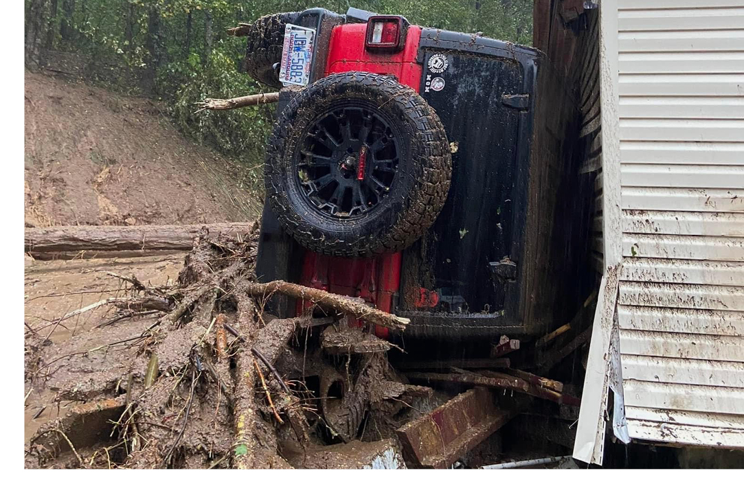 Jeep on it's side after Hurricane Helene in North Carolina