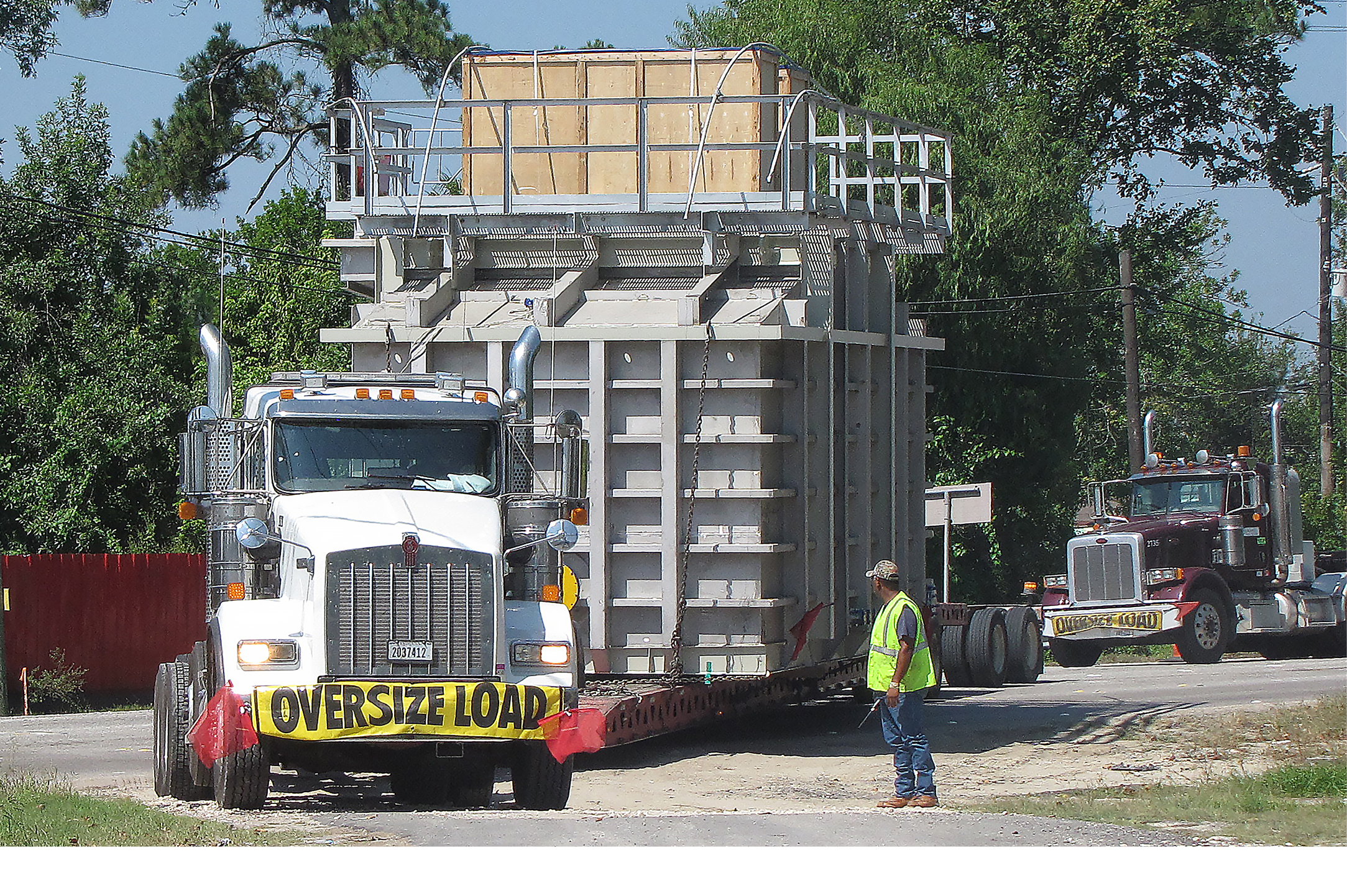 Buchanan employee helps a driver navigate his oversized load