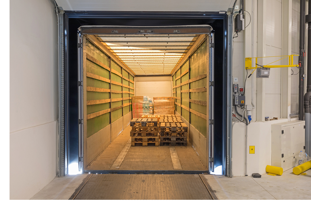 Semi truck trailer being loaded with freight