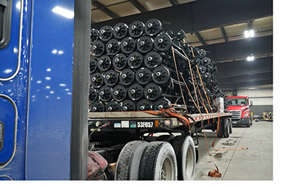 Buchanan flatbed being loaded up with automotive components for delivery across North America.