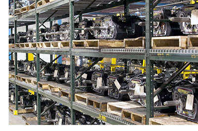 Automotive components and parts waiting to be transported by Buchanan Hauling to their delivery location.