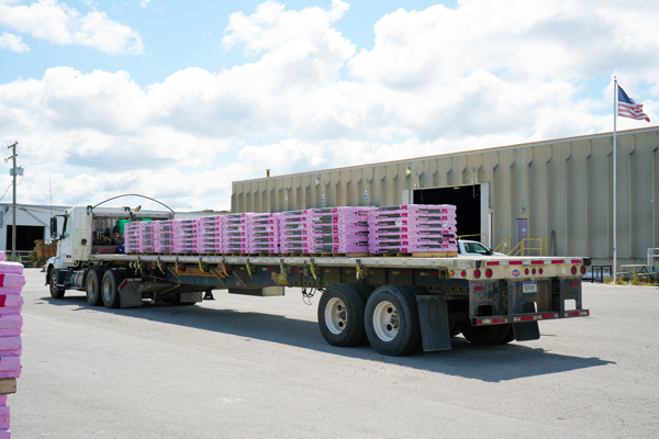 Buchanan Logistics loading up shingles and building materials to be shipped to a retail customer.