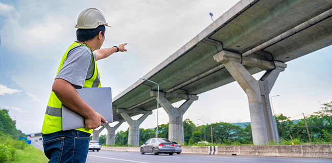 Site Inspectors from Buchanan reviewing clearance for freight delivery.